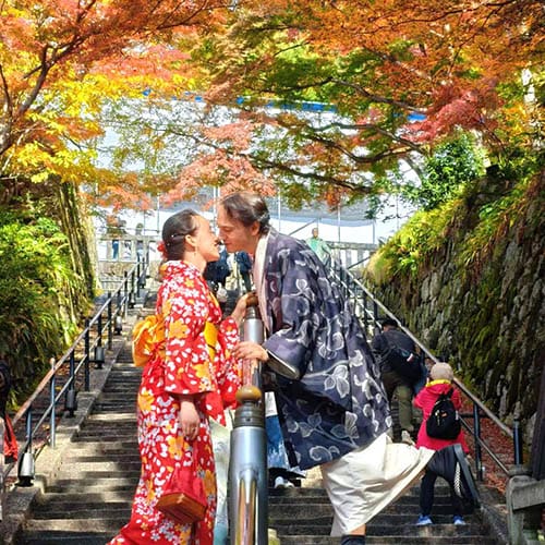 Honeymoon Couples - Romantic couple in kimono enjoying autumn momiji foliage in Kyoto