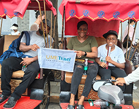 Riding rickshaw in Beijing historical street tour