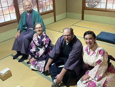 Family dressed up in dynamic traditional garments