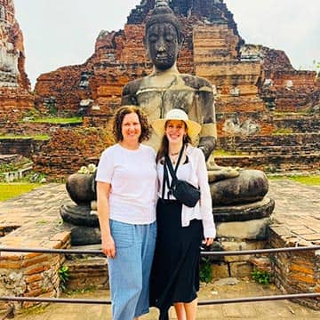 Travelers visiting Wat Saket Golden Mount in Bangkok, Thailand during a cultural sightseeing tour