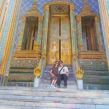 The iconic porcelain towers of Wat Arun at Chao Phraya River