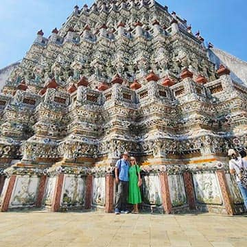 The iconic porcelain towers of Wat Arun at Chao Phraya River