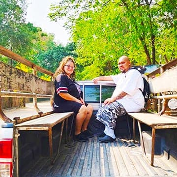 Couple enjoying a river and nature experience during a Thailand private tour