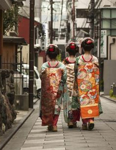 Kyoto historic Gion geisha alleyways scene at dusk